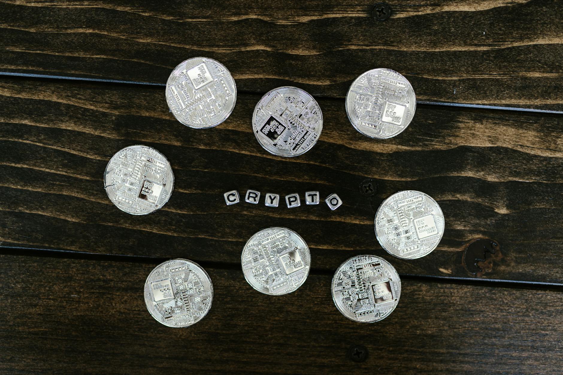 Laptop screen showing a blockchain logo and connecting status.