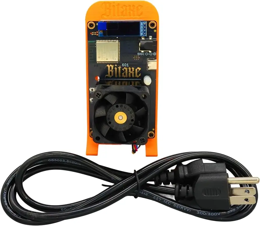 Bitaxe Gamma Bitcoin miner device with a fan and power cable.