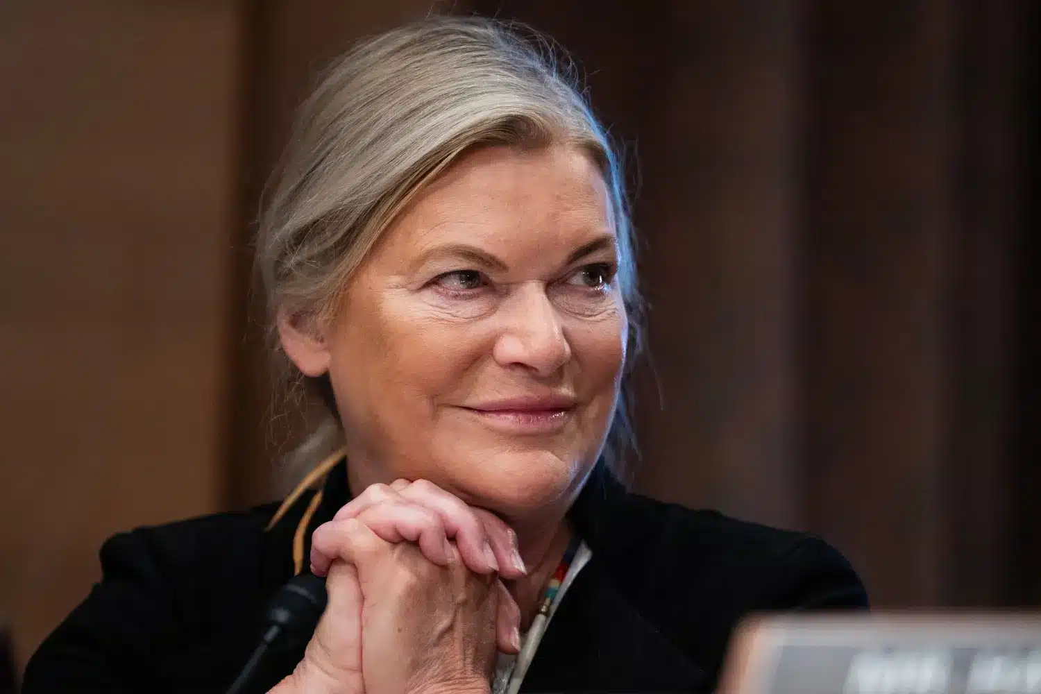 Cynthia Lummis, US Senator from Wyoming, smiling during a Senate hearing.