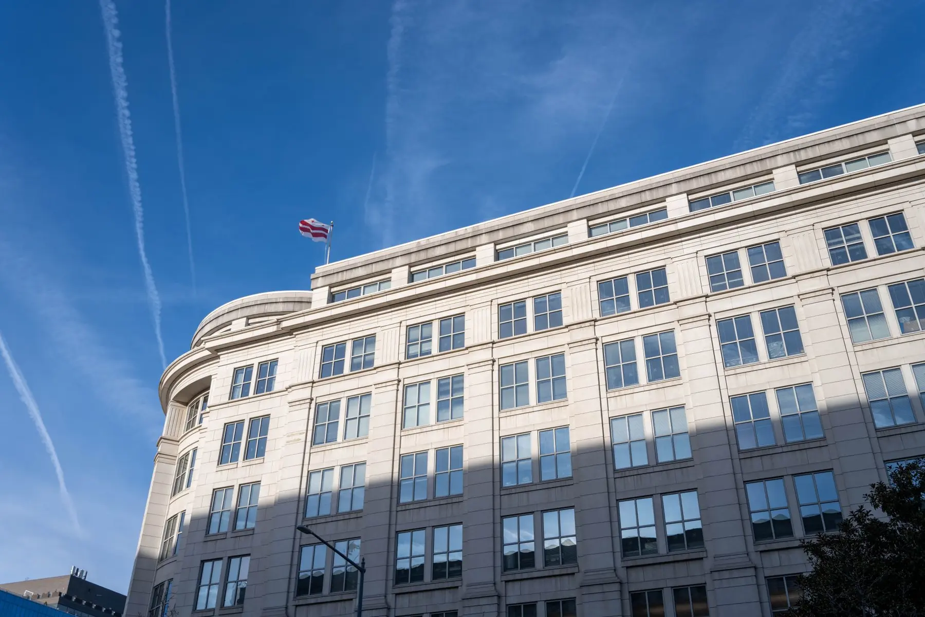 Exterior view of the Commodity Futures Trading Commission headquarters building under a clear blue sky