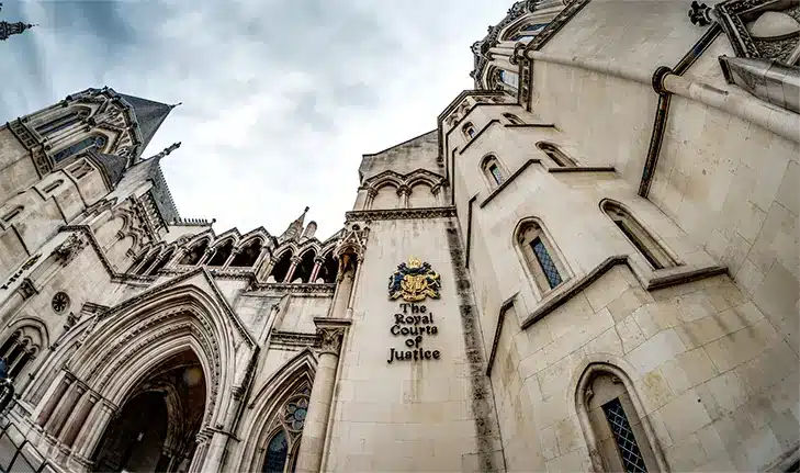 Low angle view of the Victorian Gothic facade of the Royal Courts of Justice in London
