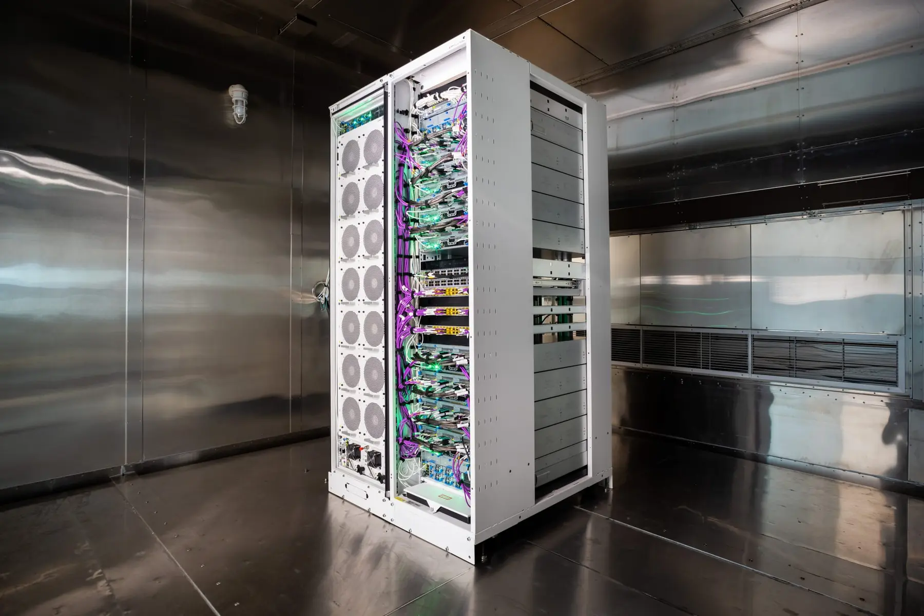 Modern AI server rack with high-density GPUs and liquid cooling pipes in a sterile data center environment
