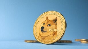 Dogecoin sotto pressione a $0,21: c'è rischio di un forte calo se il supporto dovesse cedere