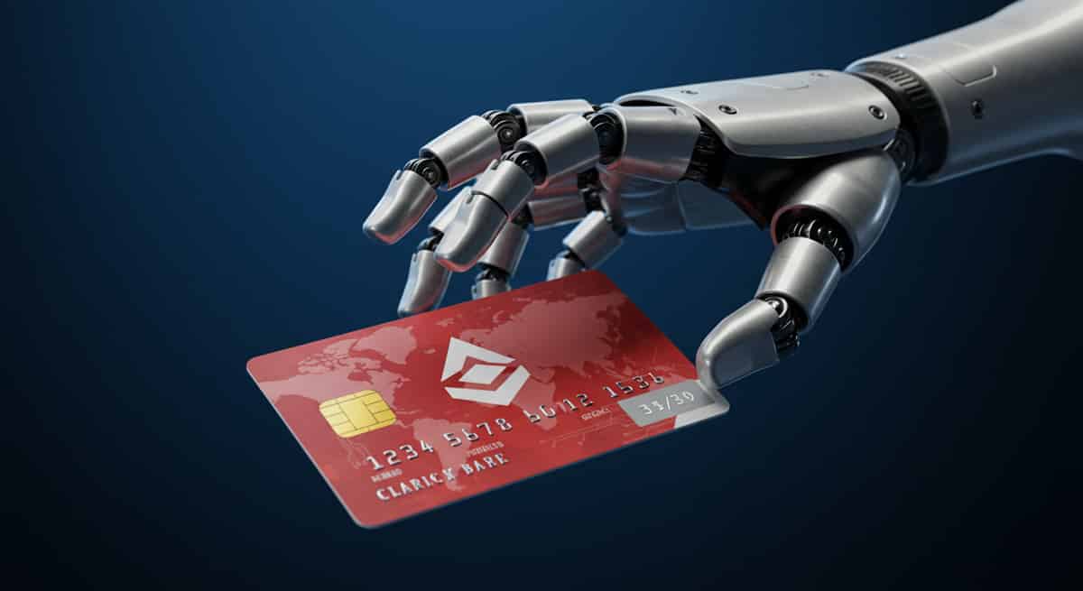 仮想通貨 クレジットカード-クレジットカードとロボットの手