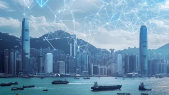 香港の都市景観の上にブロックチェーン技術を象徴するデジタルネットワーク接続が表示されている様子。